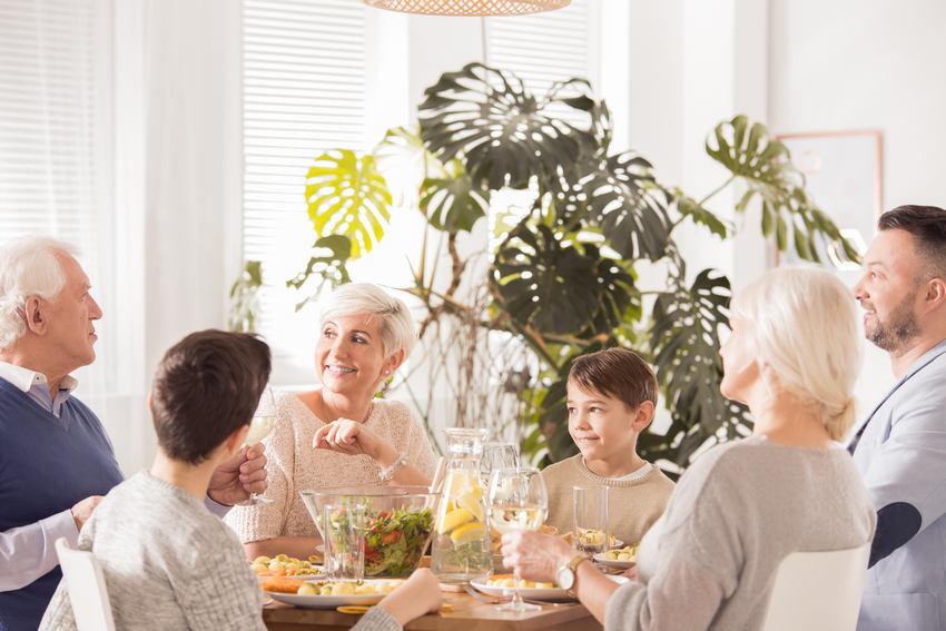 family with seniors eating dinner