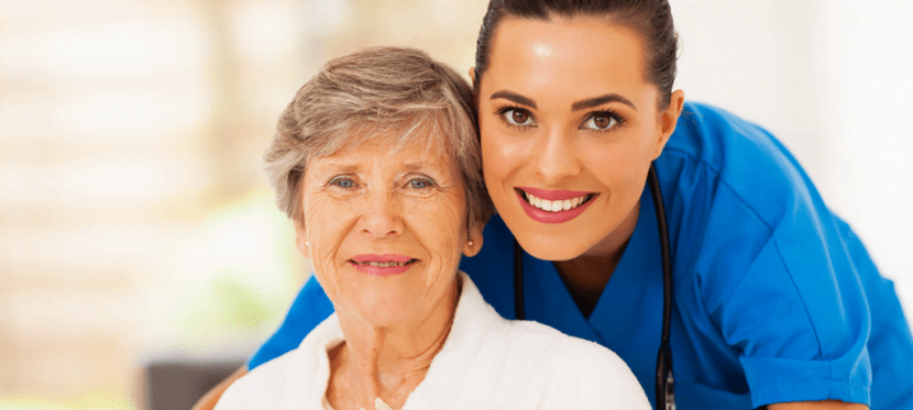 family caregiver posing with patient